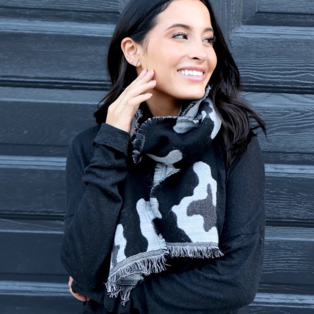 Blacks and gray cami print scarf with fringe hemline.